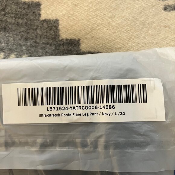 Quince Ultra-Stretch Ponte Flare Leg Pants in Navy - Picture 2 of 6